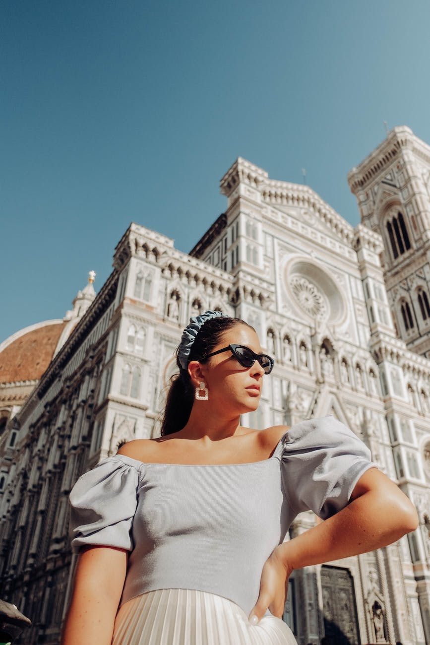 woman in trendy outfit near florence cathedral of italy